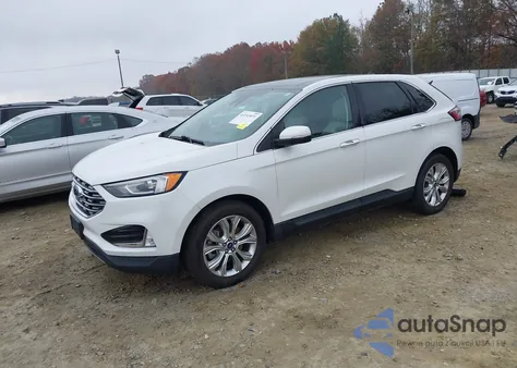 2021 Ford Edge Titanium z USA, uszkodzony, nr VIN 2FMPK4K91MBA20995